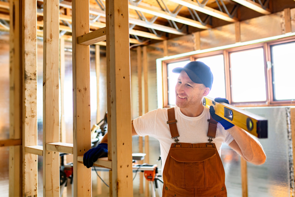 a construction worker working on a house